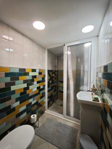 Ένα μπάνιο στο Emena Art Guesthouse