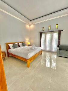 Katil atau katil-katil dalam bilik di nyoman sekumpul house