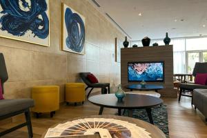 TV a/nebo společenská místnost v ubytování Residence Inn by Marriott Merida