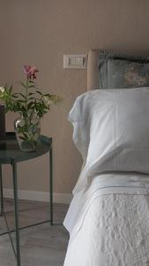 A bed or beds in a room at Corte castella