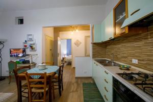 Kuchyň nebo kuchyňský kout v ubytování Casa Vacanza Terra Mia