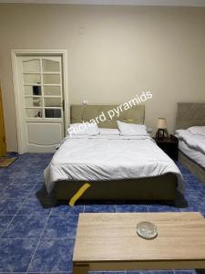 Krevet ili kreveti u jedinici u objektu Richard Pyramids inn hotel