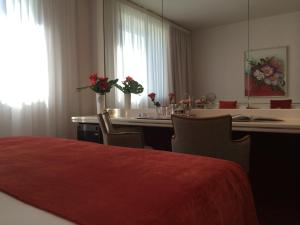 Posteľ alebo postele v izbe v ubytovaní Starhotels Cristallo Palace