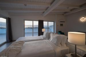Postel nebo postele na pokoji v ubytování Oasis White Hotel + 22 fotografií