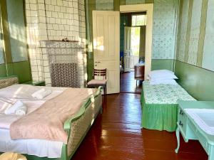Postel nebo postele na pokoji v ubytování Martv'Elle Boutique Guesthouse