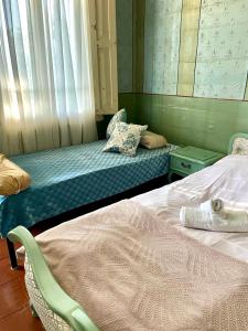 Postel nebo postele na pokoji v ubytování Martv'Elle Boutique Guesthouse