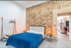 Giường trong phòng chung tại La Casa Di Eva In Via Nizza
