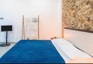 Giường trong phòng chung tại La Casa Di Eva In Via Nizza