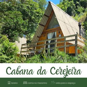 a cabin in the woods with the text cacana da cercifera at Cabanas Bela Vista in Rolante