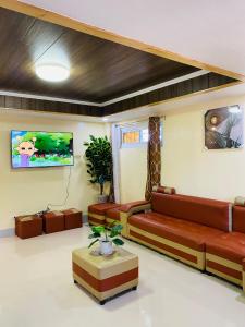 Μια τηλεόραση ή/και κέντρο ψυχαγωγίας στο The Cozy Cone2 +13 φωτογραφίες