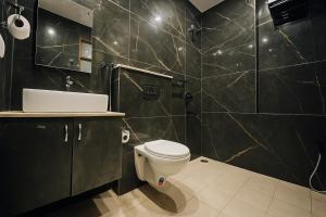 Koupelna v ubytování Hotel Palm View by JMD Group + 16 fotografií