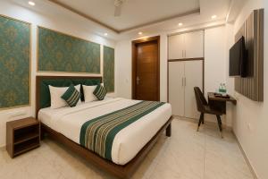 Voodi või voodid majutusasutuse Hotel Palm View by JMD Group toas