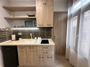 Kuchyň nebo kuchyňský kout v ubytování Elden Bnb Xanthi