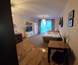 Η κουζίνα ή μικρή κουζίνα στο Apartament KOŁOBRZEG z parkingiem