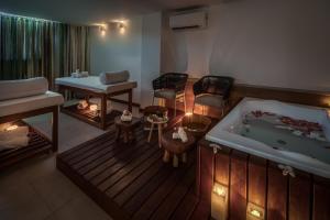 Postel nebo postele na pokoji v ubytování Japaratinga Lounge Resort - All Inclusive
