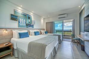 Postel nebo postele na pokoji v ubytování Japaratinga Lounge Resort - All Inclusive