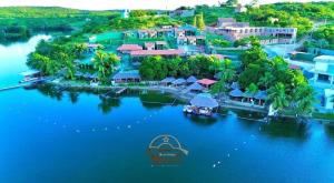 an aerial view of a resort on the water at Aconchego Matuto - Hotel Club e Restaurante in Canindé de São Francisco