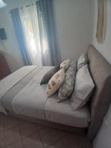 Posteľ alebo postele v izbe v ubytovaní Artemis Bakerys House 2