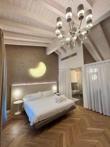 Postel nebo postele na pokoji v ubytování Hotel Bigio + 37 fotografií