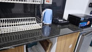 Dapur atau dapur kecil di Pazoori Stays Superior Studios