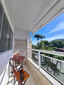En balkon eller terrasse på POUSADA PARAISO da BARRA DA TIJUCA
