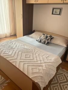 Posteľ alebo postele v izbe v ubytovaní Apartmani Josipović