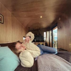Postel nebo postele na pokoji v ubytování Vive Rela Tiny Houses
