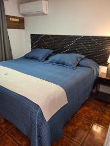 Postel nebo postele na pokoji v ubytování Habitaciones Barrancas