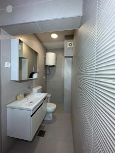 Uma casa de banho em Apartmani Simona