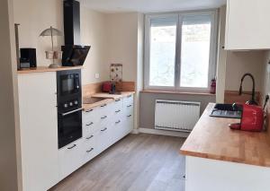 Η κουζίνα ή μικρή κουζίνα στο KerMady, maison proche de la mer +9 φωτογραφίες