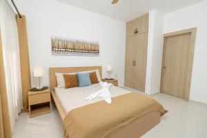San Rafael del YumaにあるModern 2BR Escape Near Bayahibe Beach and Poolのギャラリーの写真 +27枚の写真
