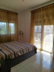 Posteľ alebo postele v izbe v ubytovaní Iris Room