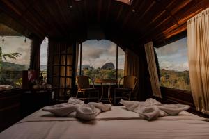Voodi või voodid majutusasutuse Glamping The Mountain toas