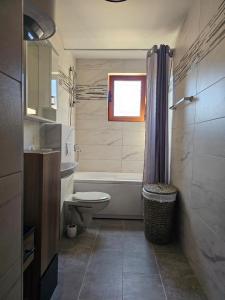 Ένα μπάνιο στο Adria Montenegro Apartment