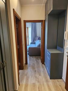 a room with a bedroom with a bed and a closet at Adria Montenegro Apartment in Tušupi +11 photos