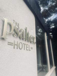 a hotel sign on the side of a building at The Psalter in Sheffield