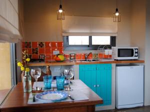 Η κουζίνα ή μικρή κουζίνα στο La Cambicha Ranchos