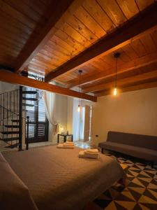 Postel nebo postele na pokoji v ubytování Civico 22 - HOLIDAY HOME