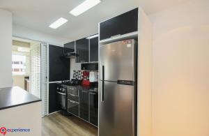 Kuchyň nebo kuchyňský kout v ubytování Apartamentos no Morumbi