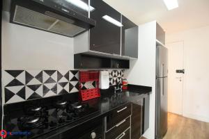 Kuchyň nebo kuchyňský kout v ubytování Apartamentos no Morumbi