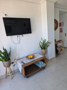 TV a/nebo společenská místnost v ubytování Mirador Al Mar