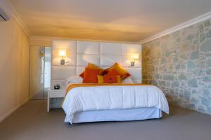 Кровать или кровати в номере Casa Hidalgo Hotel Boutique