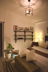 Voodi või voodid majutusasutuse Pomela Cottage-Homestay In Huế toas