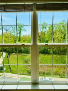 a window in a room with a view of a field at Premium Bedroom & Private Bathroom Long or Short Term 1 in Dale City