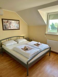 Uma cama ou camas num quarto em Vikendica Dva labuda