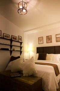 Voodi või voodid majutusasutuse Pomela Cottage-Homestay In Huế toas