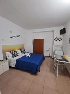 Postel nebo postele na pokoji v ubytování Osteria B&B Il Rifugio
