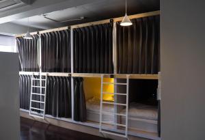 a couple of bunk beds in a room at Movylodge in Bangkok +47 photos