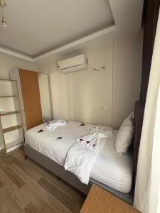 Ένα ή περισσότερα κρεβάτια σε δωμάτιο στο Nativo Otel