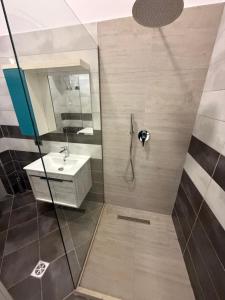 Koupelna v ubytování Marika Apart Hotel